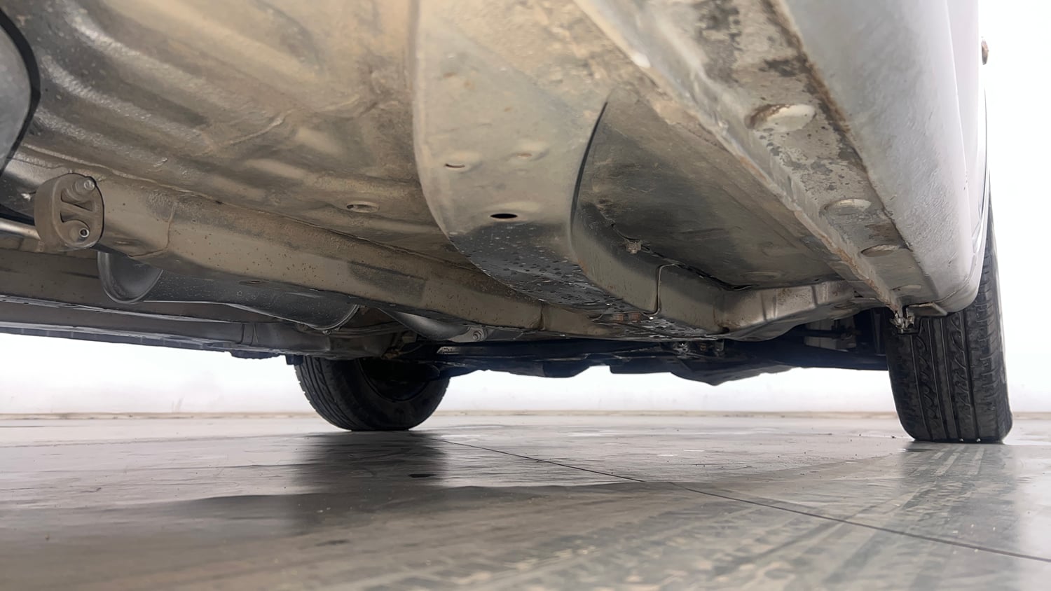 Used 2013 Honda Brio S MT Petrol Manual extra REAR RIGHT UNDERBODY VIEW