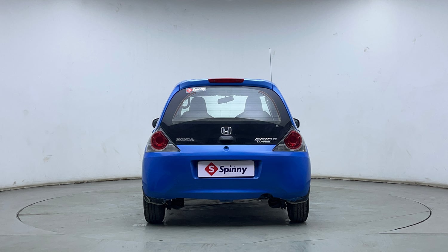 Used 2013 Honda Brio V MT Petrol Manual exterior BACK VIEW