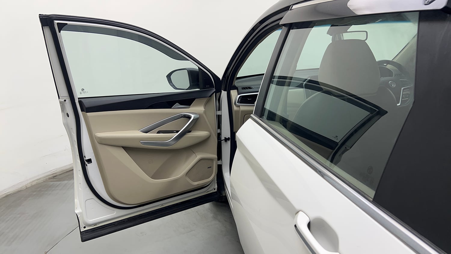 Used 2023 MG Motors Hector 1.5 Sharp CVT Dual Tone Petrol Automatic interior LEFT FRONT DOOR OPEN VIEW