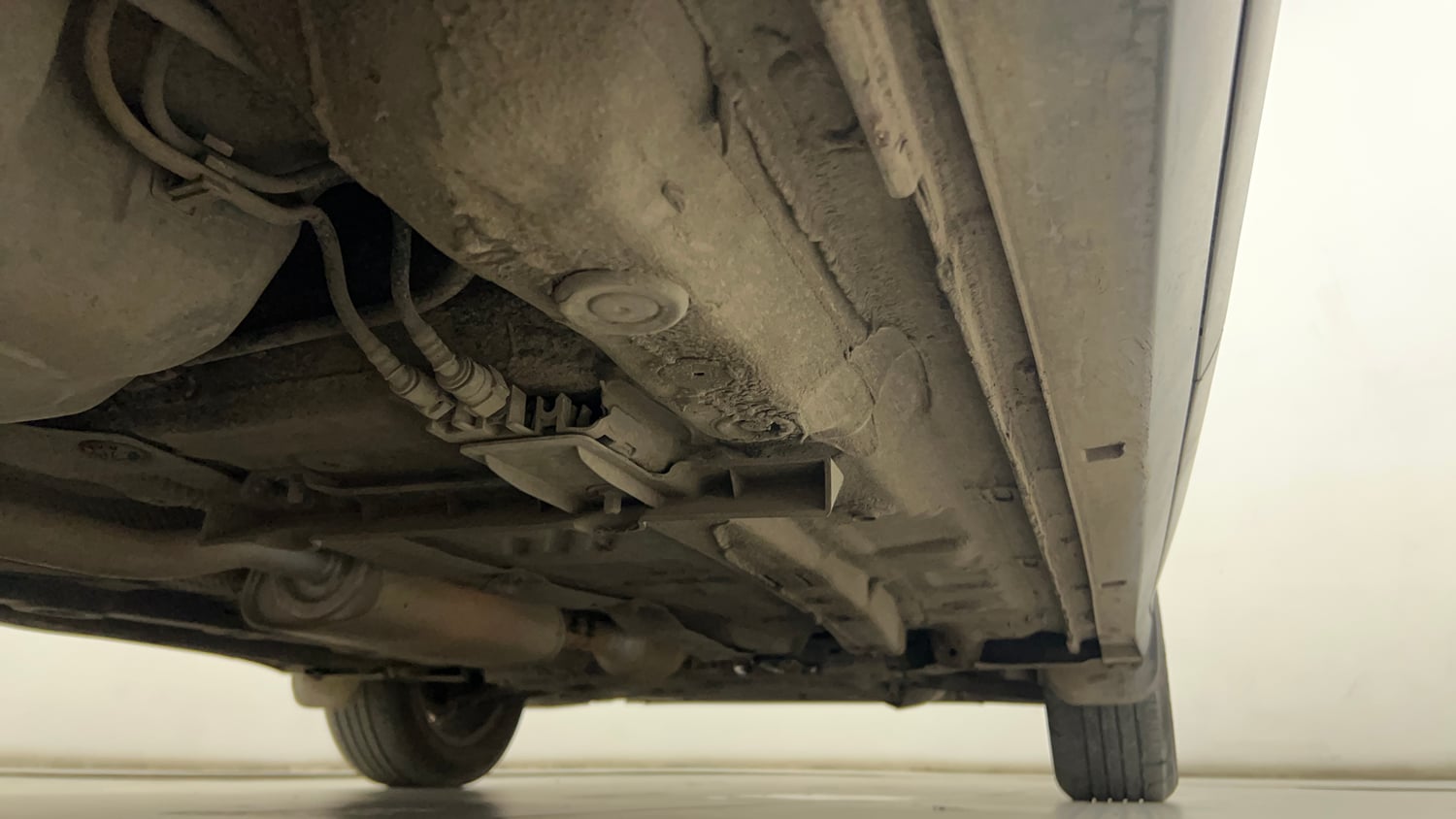 Used 2022 Volkswagen Taigun Highline 1.0 TSI AT Petrol Automatic extra REAR RIGHT UNDERBODY VIEW