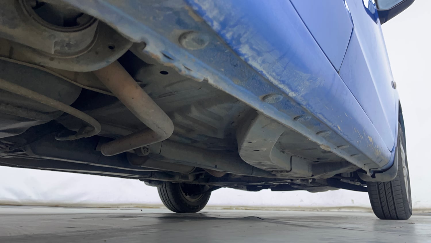 Used 2013 Honda Brio V MT Petrol Manual extra REAR RIGHT UNDERBODY VIEW