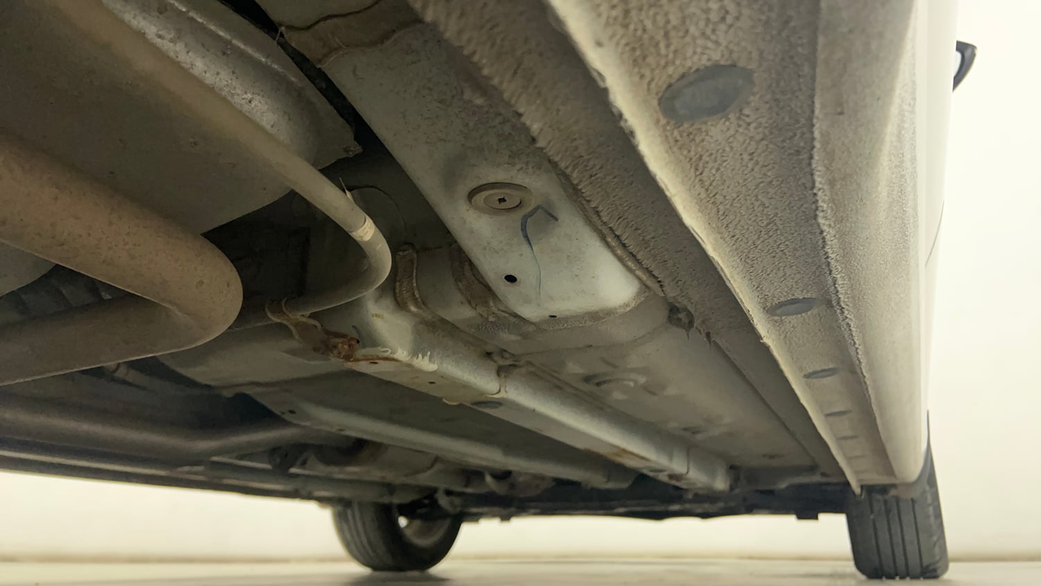 Used 2024 Hyundai Verna SX 1.5 Petrol MT Petrol Manual extra REAR RIGHT UNDERBODY VIEW