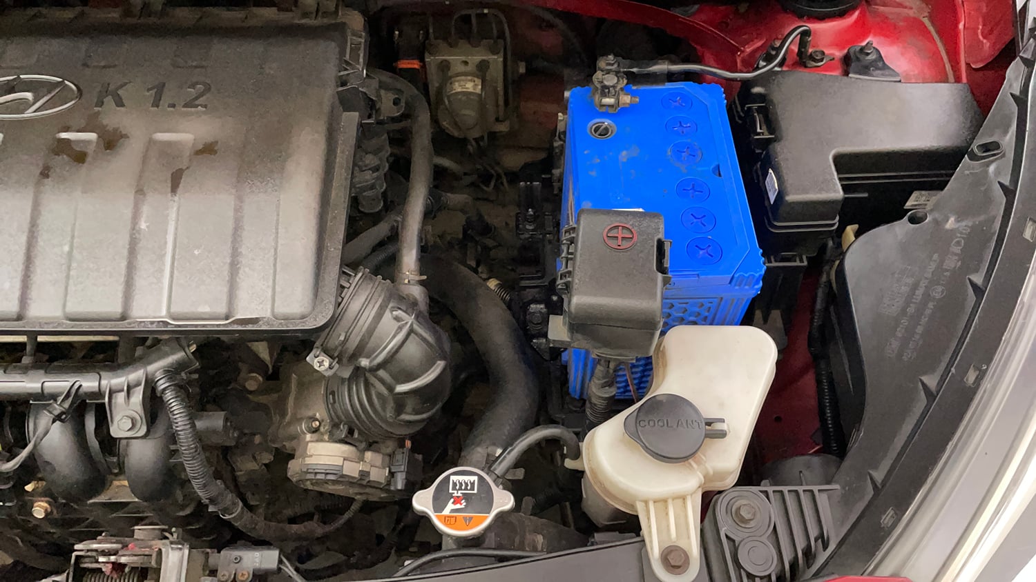 Used 2014 Hyundai Xcent S 1.2 (O) Petrol Manual engine ENGINE LEFT SIDE VIEW
