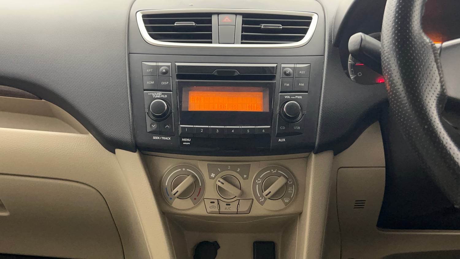 Used 2016 Maruti Suzuki Swift Dzire VXI Petrol Manual top_features Integrated (in-dash) music system