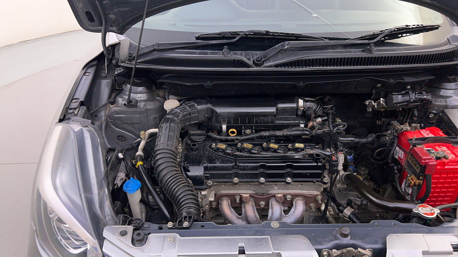Used 2019 Maruti Suzuki Baleno Zeta Petrol Manual engine ENGINE RIGHT SIDE HINGE & APRON VIEW