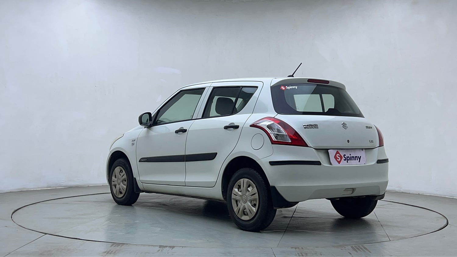 Used 2013 Maruti Suzuki Swift LXi Petrol Manual exterior LEFT REAR CORNER VIEW