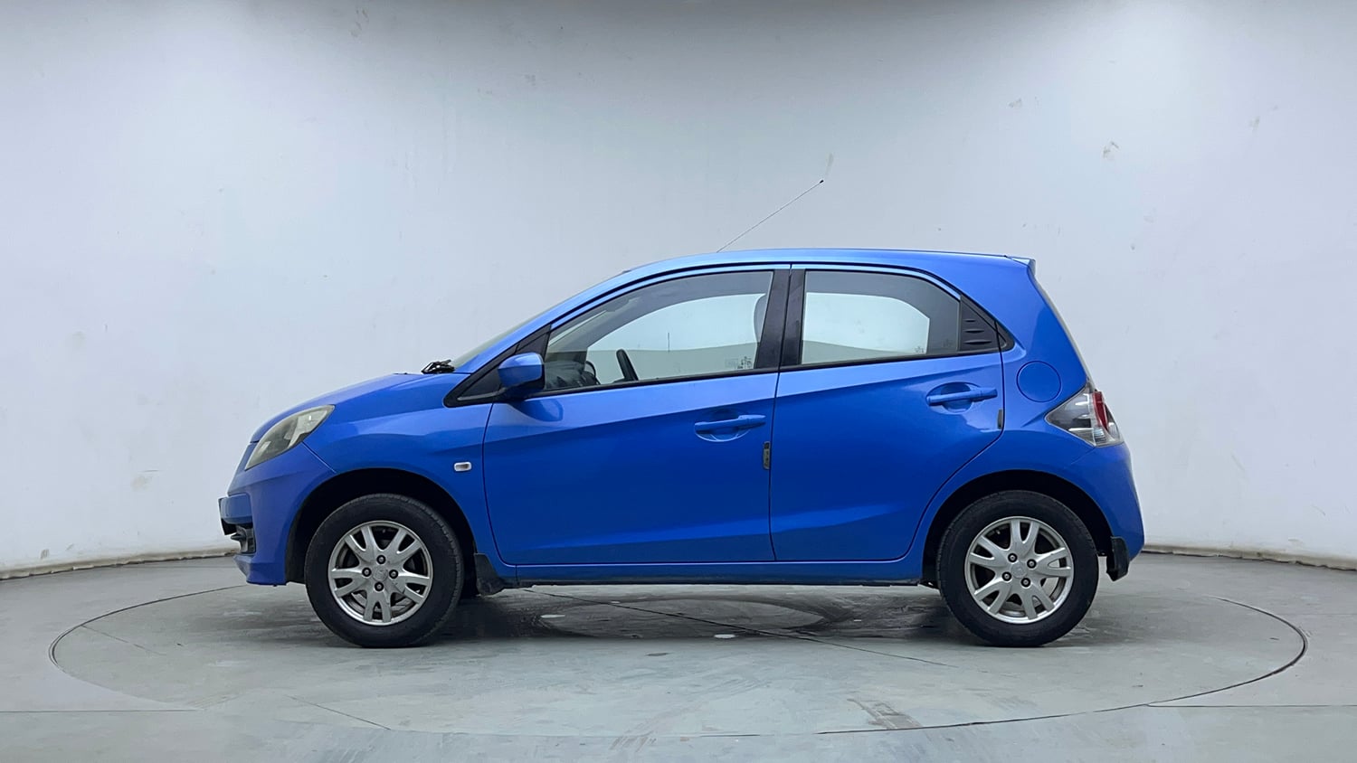 Used 2013 Honda Brio V MT Petrol Manual exterior LEFT SIDE VIEW