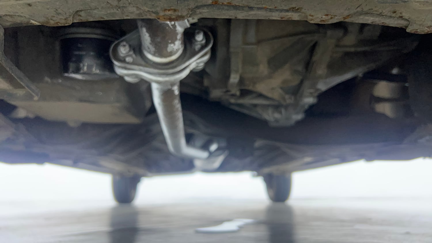 Used 2015 Maruti Suzuki Celerio VXi AMT Petrol Automatic extra FRONT LEFT UNDERBODY VIEW