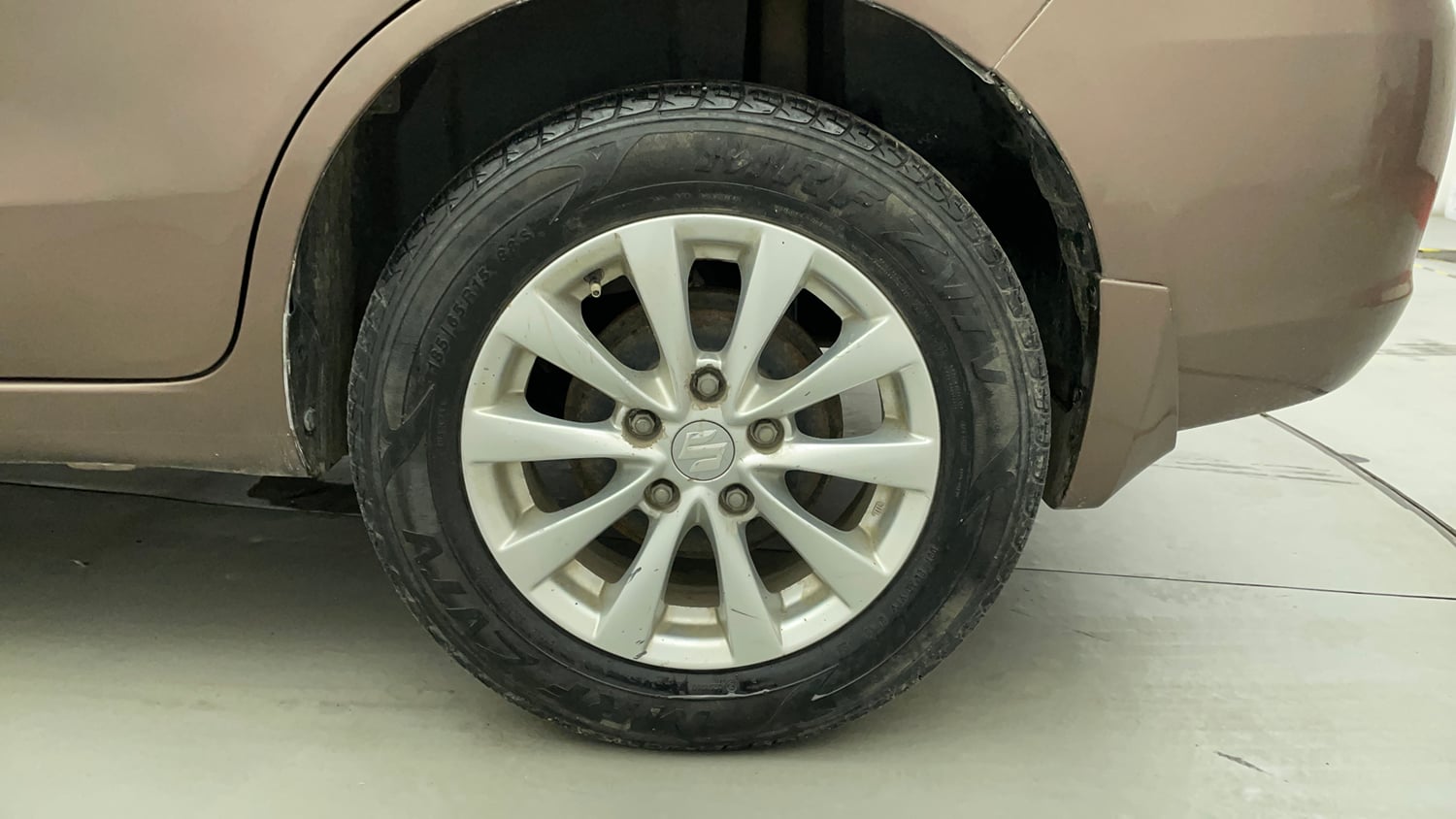 Used 2013 Maruti Suzuki Ertiga ZXi Petrol Manual tyres LEFT REAR TYRE RIM VIEW