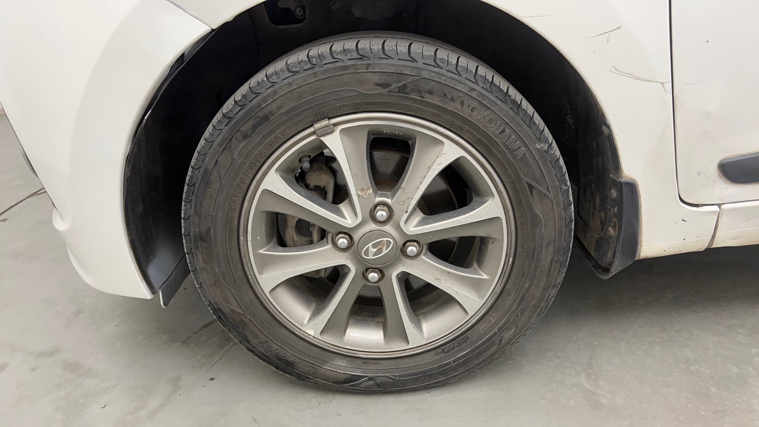 Used 2014 Hyundai Grand i10 Asta 1.2 Kappa VTVT (O) Petrol Manual tyres LEFT FRONT TYRE RIM VIEW