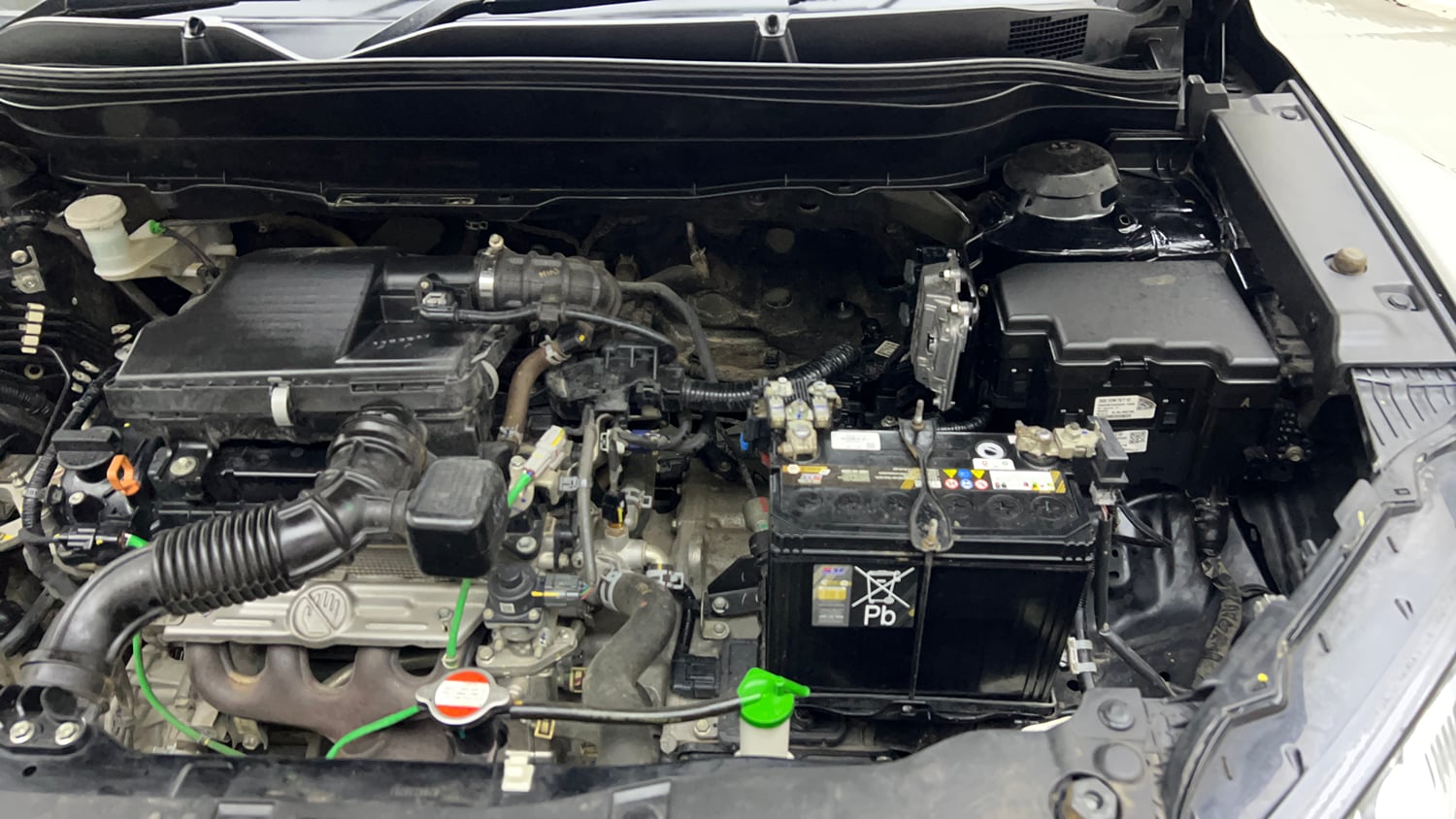 Used 2023 Maruti Suzuki Grand Vitara Zeta Smart Hybrid AT Petrol Automatic engine ENGINE LEFT SIDE VIEW