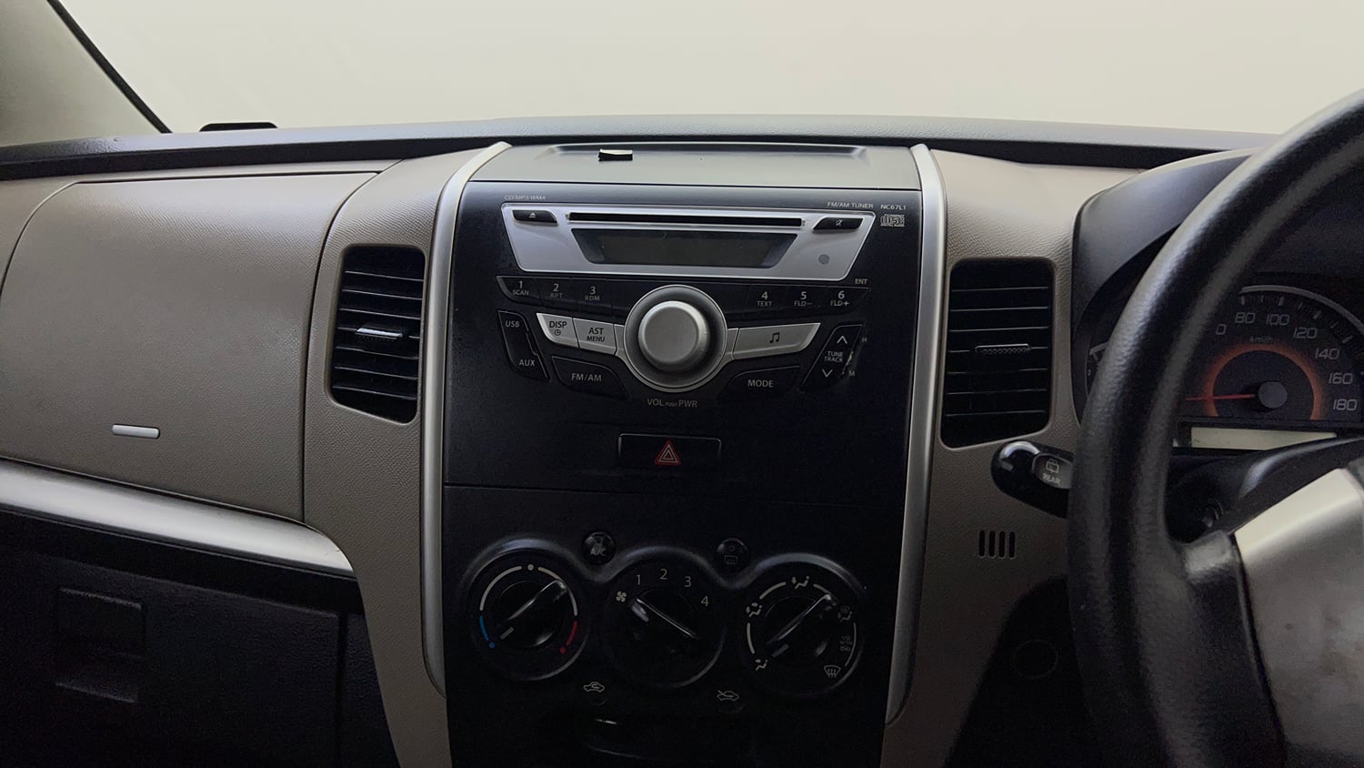 Used 2015 Maruti Suzuki Wagon R VXI Petrol Manual top_features Integrated (in-dash) music system
