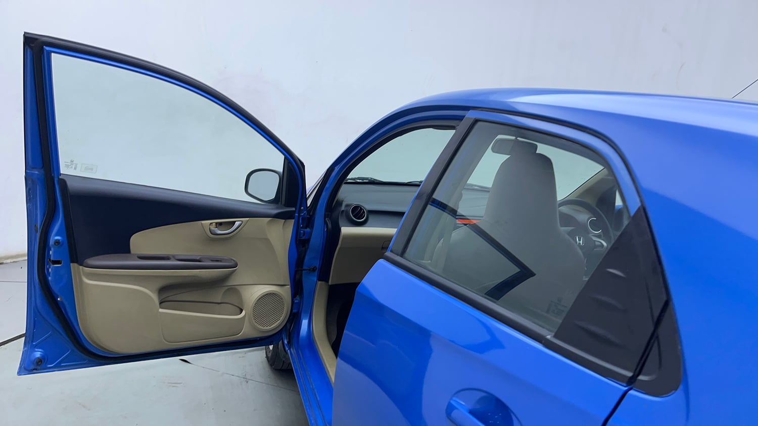 Used 2013 Honda Brio V MT Petrol Manual interior LEFT FRONT DOOR OPEN VIEW