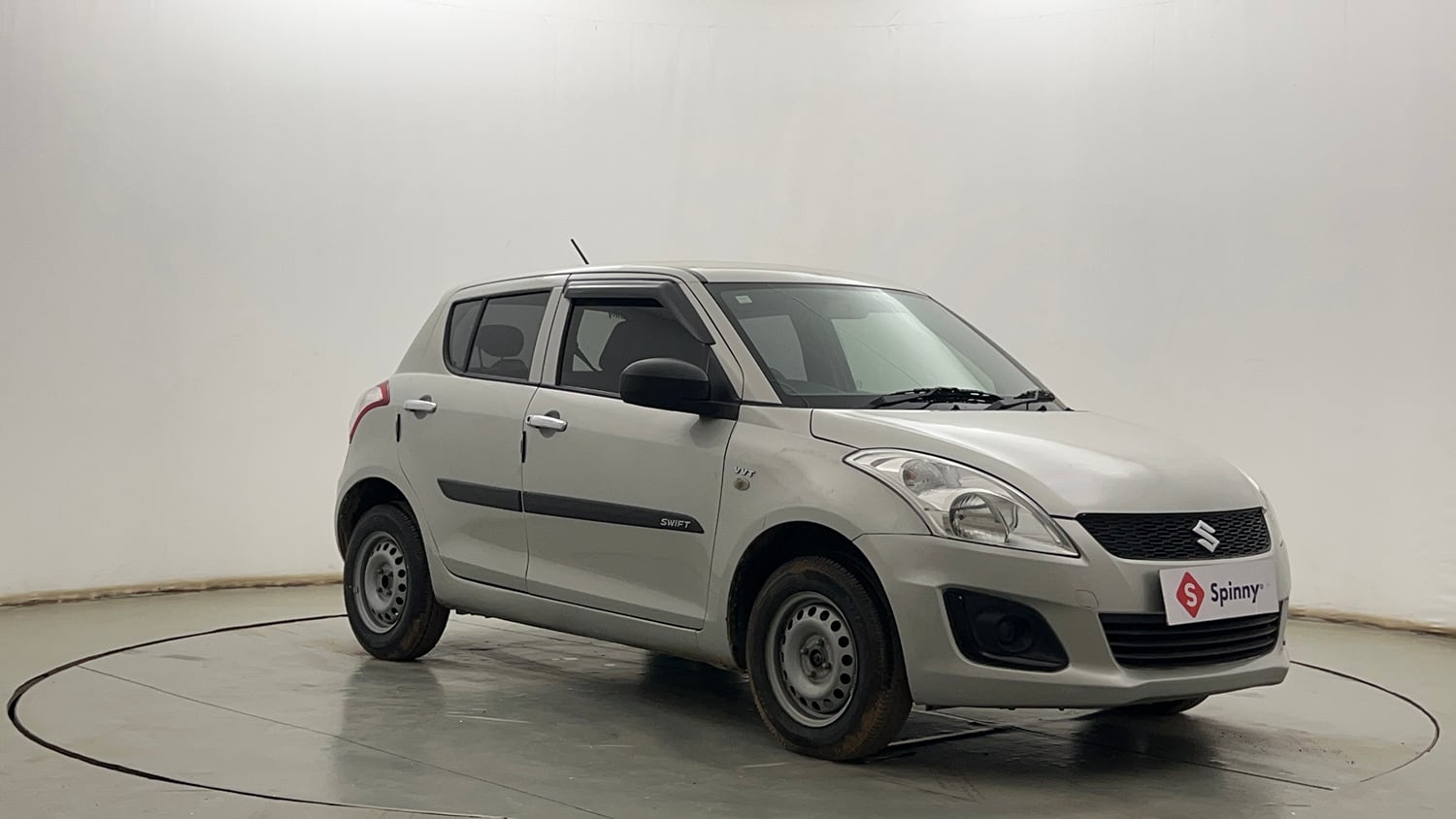 Used 2017 Maruti Suzuki Swift Lxi (O) Petrol Manual exterior RIGHT FRONT CORNER VIEW