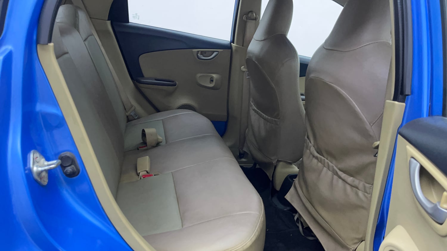 Used 2013 Honda Brio V MT Petrol Manual interior RIGHT SIDE REAR DOOR CABIN VIEW