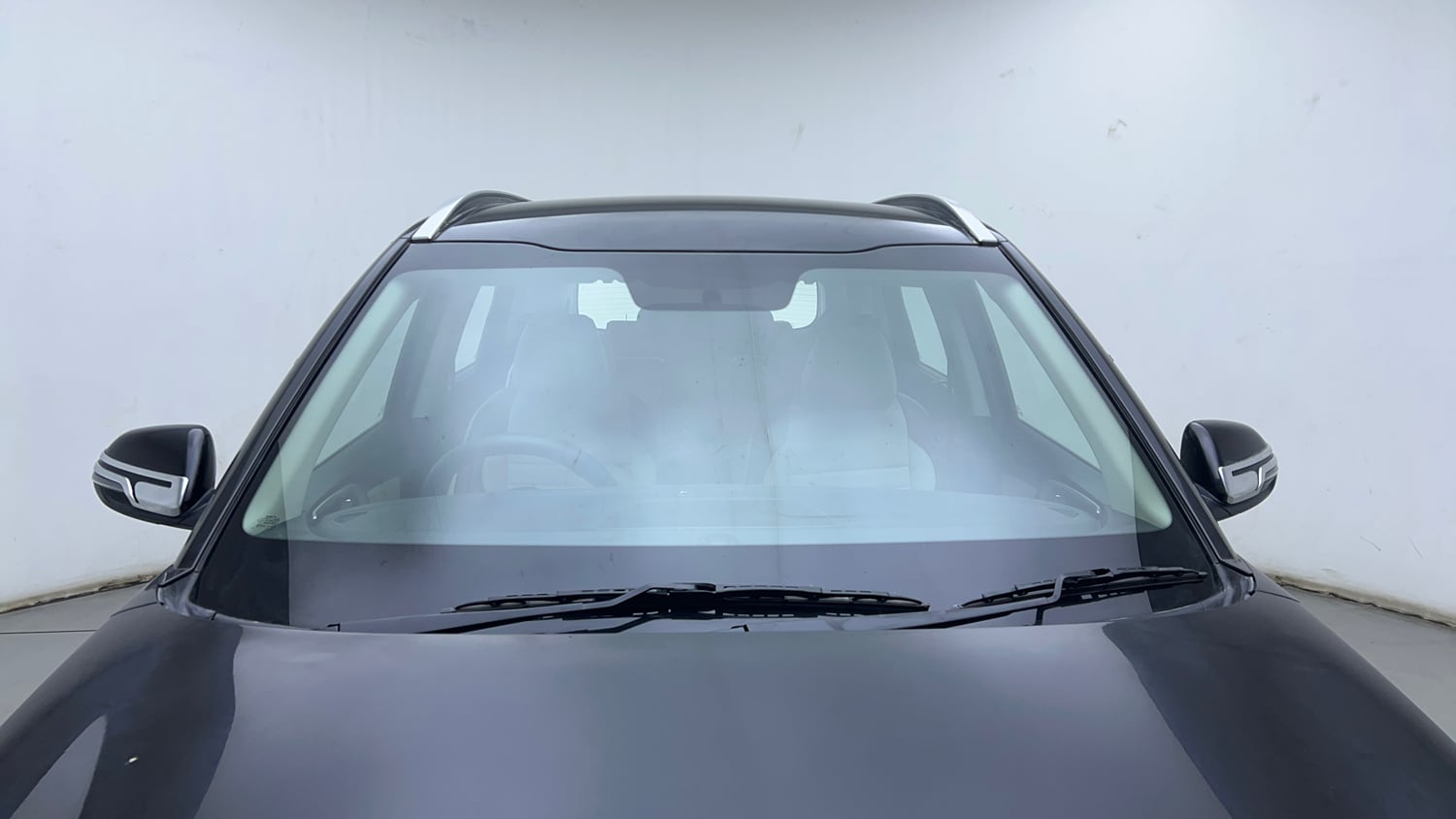 Used 2022 Kia Carens Prestige Plus 1.4 Petrol MT 7 STR Petrol Manual exterior FRONT WINDSHIELD VIEW