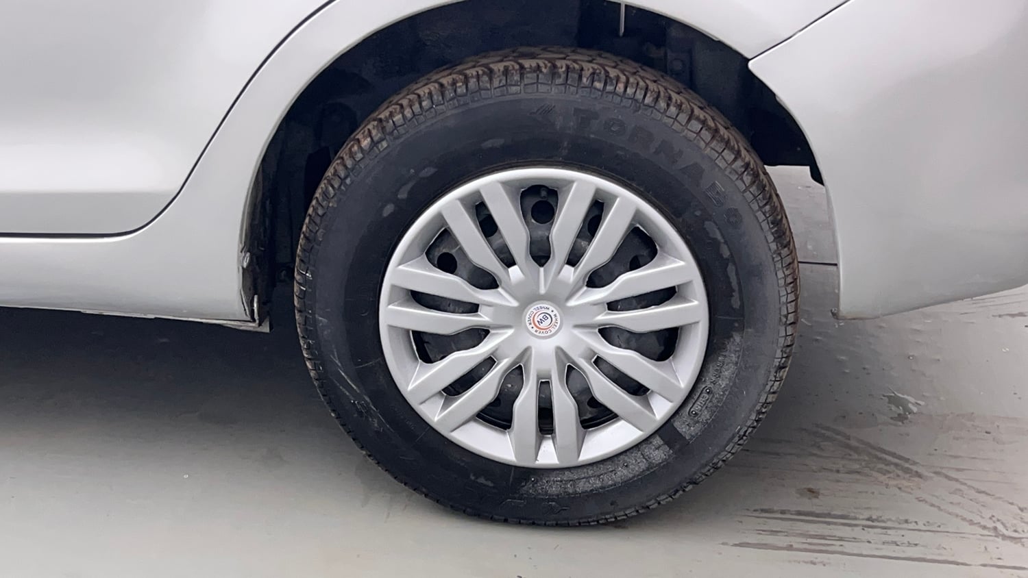 Used 2016 Maruti Suzuki Swift Dzire VXI Petrol Manual tyres LEFT REAR TYRE RIM VIEW