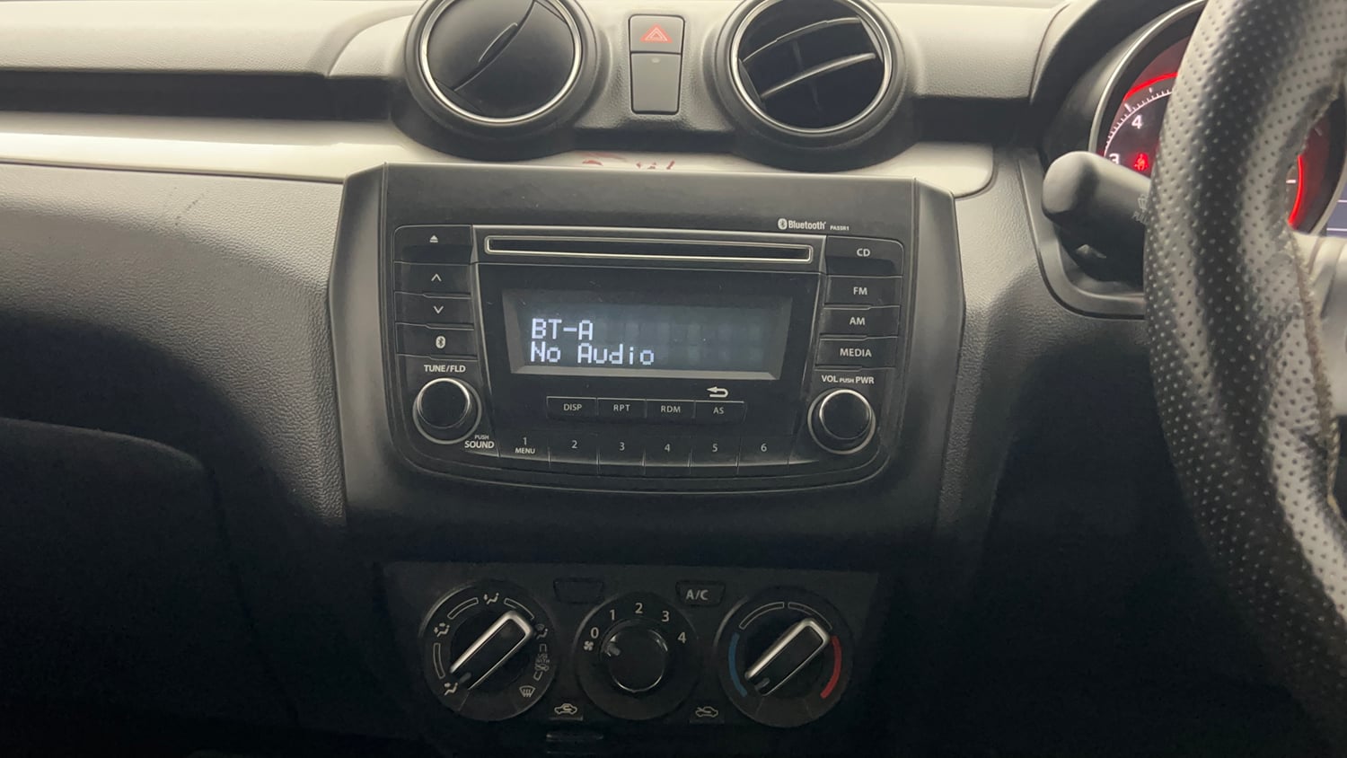 Used 2018 Maruti Suzuki Swift VXi Petrol Manual top_features Integrated (in-dash) music system
