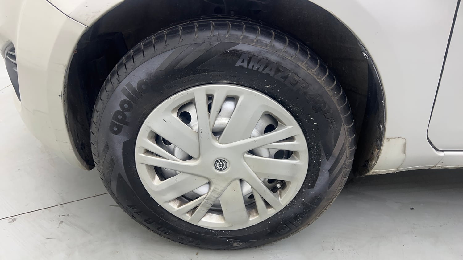 Used 2013 Maruti Suzuki Ritz Lxi BS-IV Petrol Manual tyres LEFT FRONT TYRE RIM VIEW