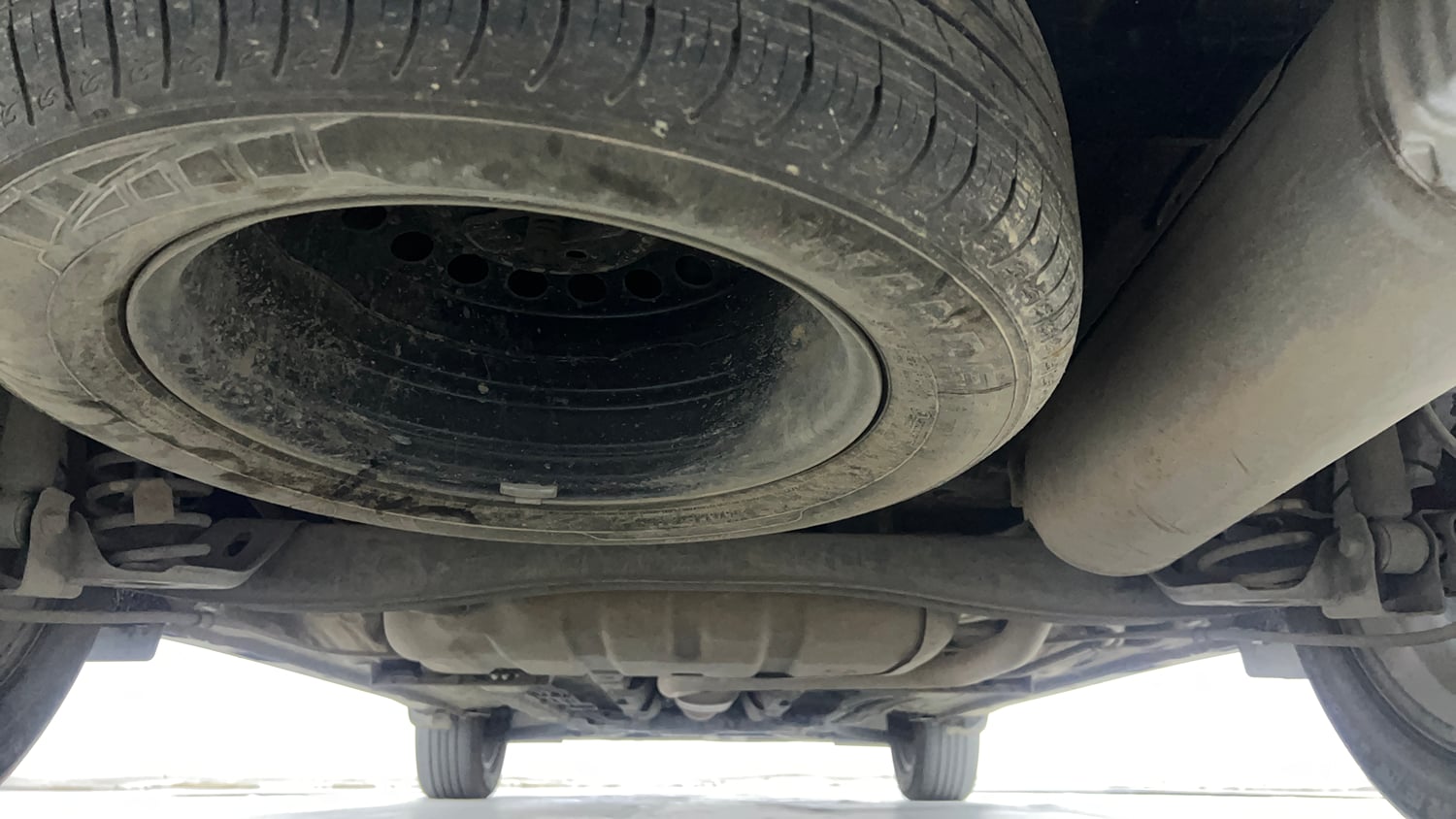 Used 2022 Kia Carens Prestige Plus 1.4 Petrol MT 7 STR Petrol Manual extra REAR UNDERBODY VIEW (TAKEN FROM REAR)