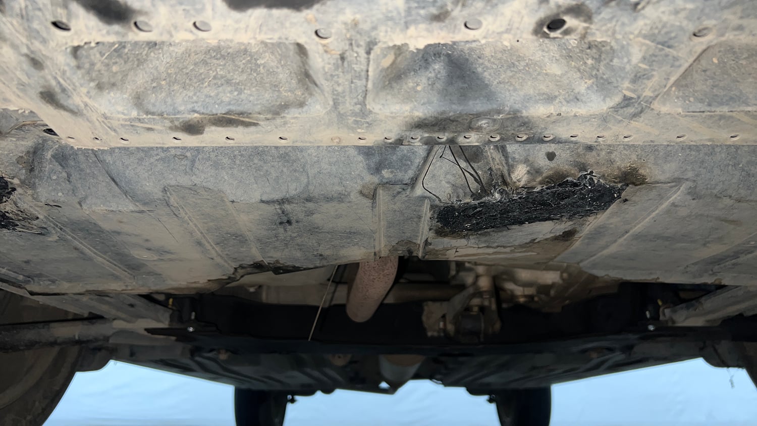 Used 2023 Maruti Suzuki Grand Vitara Zeta Smart Hybrid AT Petrol Automatic extra FRONT LEFT UNDERBODY VIEW
