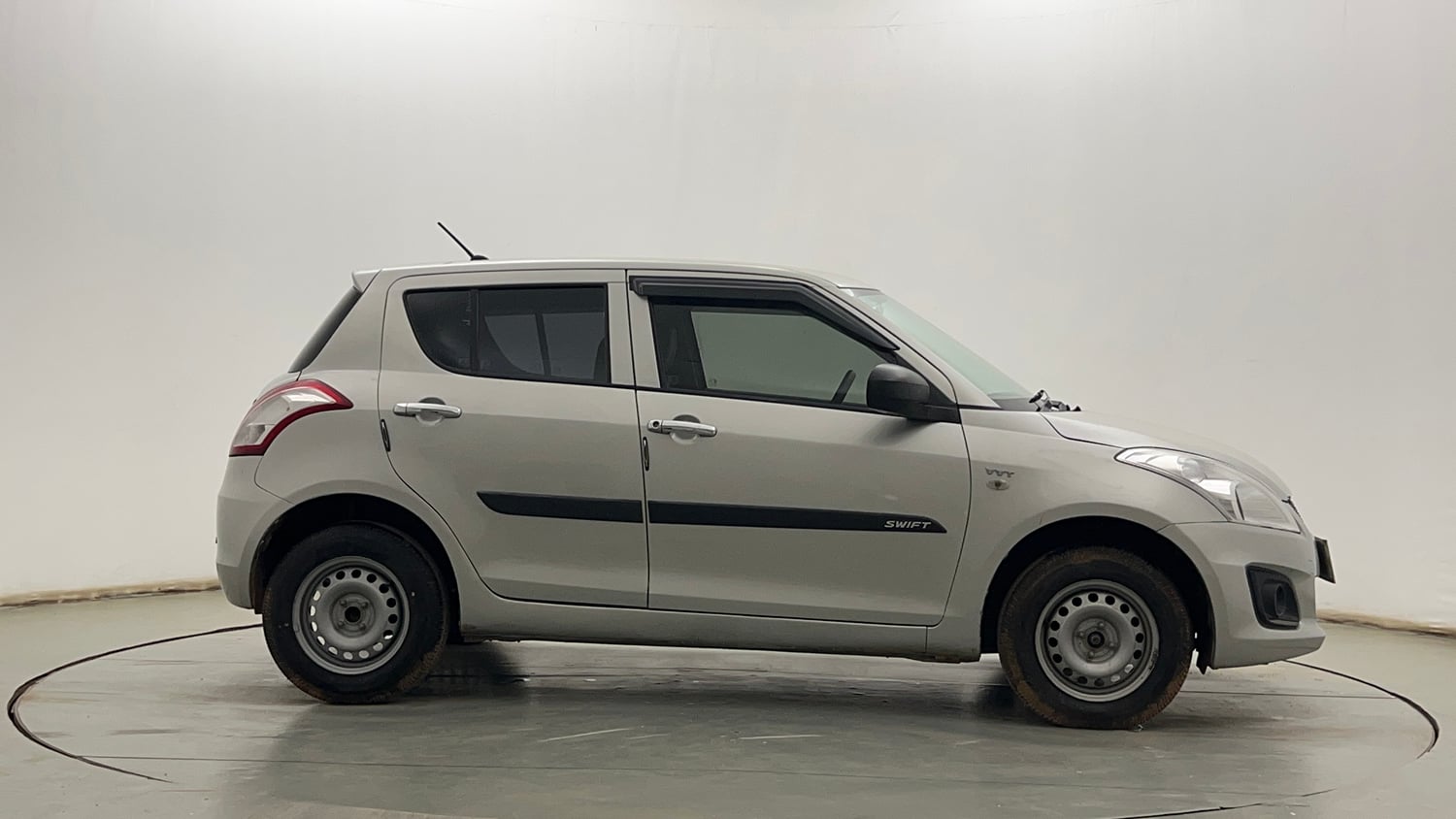 Used 2017 Maruti Suzuki Swift Lxi (O) Petrol Manual exterior RIGHT SIDE VIEW