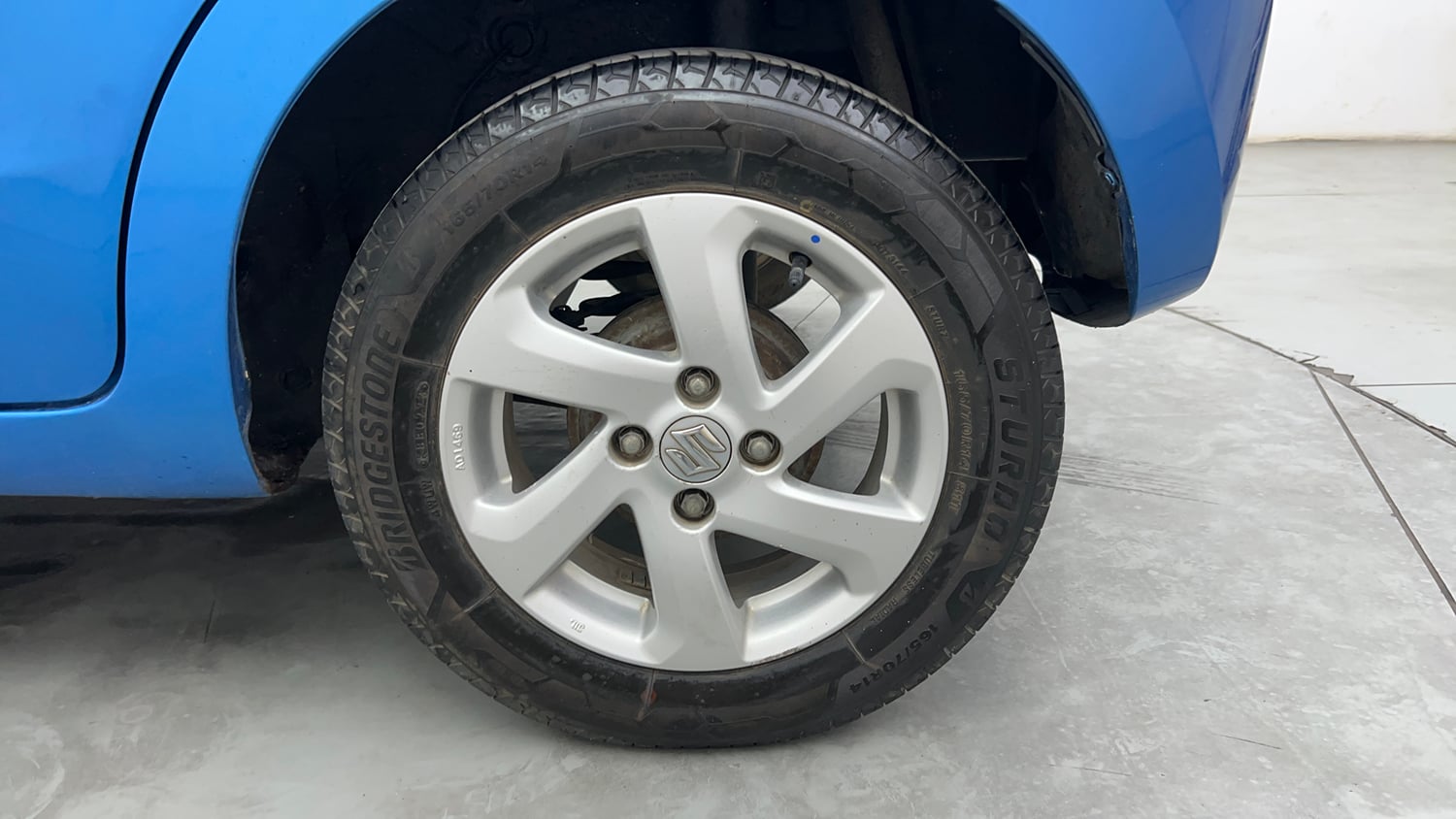 Used 2015 Maruti Suzuki Celerio ZXi Opt Petrol Manual tyres LEFT REAR TYRE RIM VIEW
