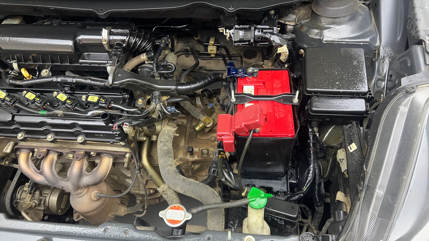 Used 2019 Maruti Suzuki Baleno Delta Petrol Manual engine ENGINE LEFT SIDE VIEW