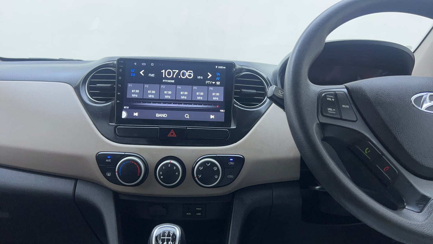 Used 2018 Hyundai Grand i10 Sportz 1.2 Kappa VTVT Petrol Manual interior MUSIC SYSTEM & AC CONTROL VIEW