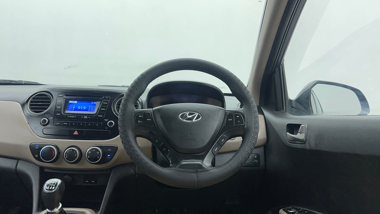 Used 2014 Hyundai Grand i10 Asta 1.2 Kappa VTVT (O) Petrol Manual interior STEERING VIEW