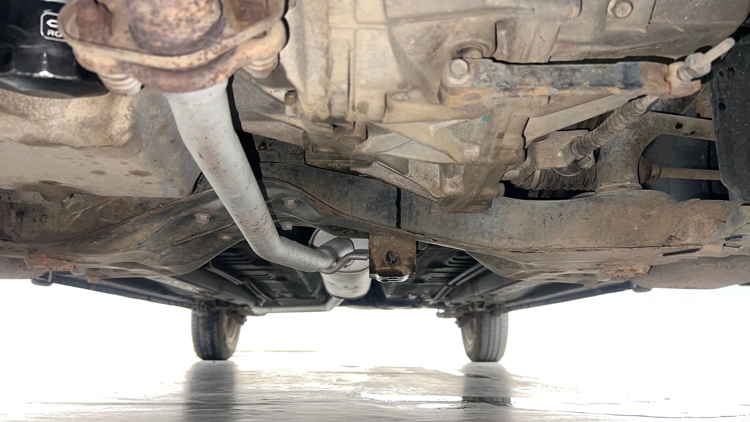 Used 2015 Maruti Suzuki Celerio ZXi Opt Petrol Manual extra FRONT LEFT UNDERBODY VIEW
