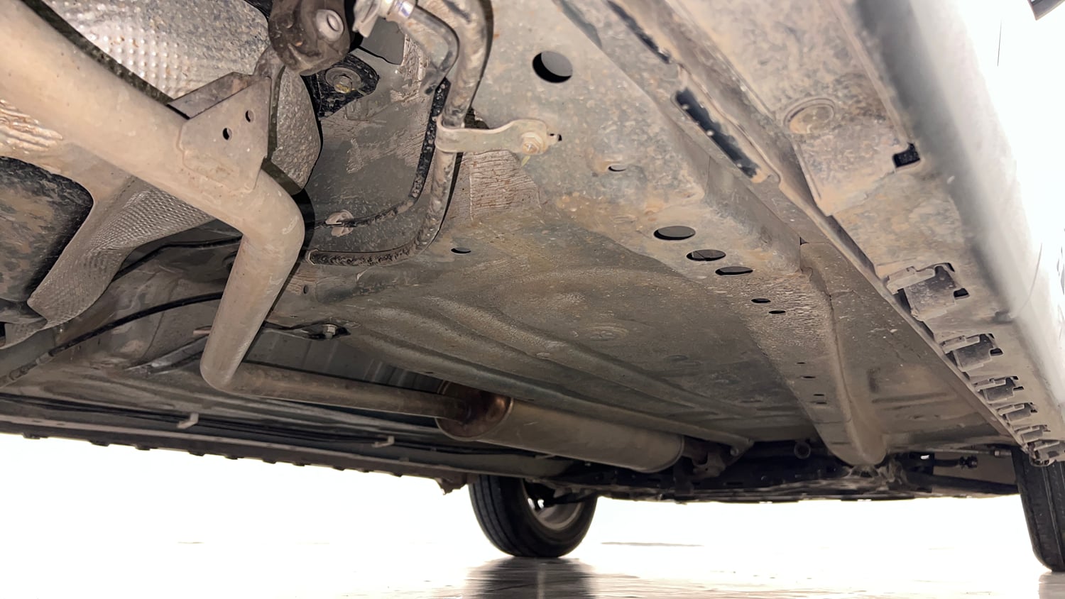 Used 2023 Maruti Suzuki Ignis Zeta 1.2 AMT Petrol Automatic extra REAR RIGHT UNDERBODY VIEW