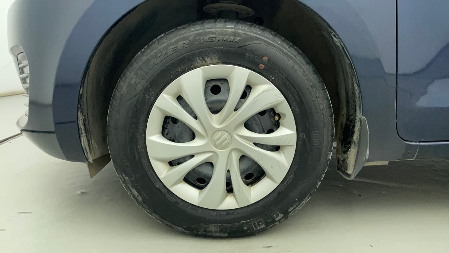 Used 2019 Maruti Suzuki Swift VXi AMT Petrol Automatic tyres LEFT FRONT TYRE RIM VIEW