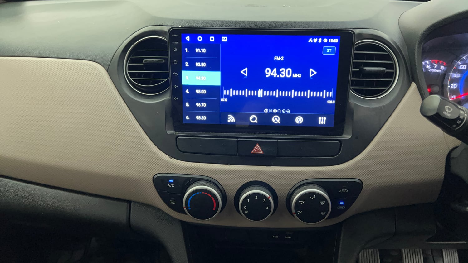 Used 2015 Hyundai Grand i10 Sportz 1.2 Kappa VTVT Petrol Manual interior MUSIC SYSTEM & AC CONTROL VIEW