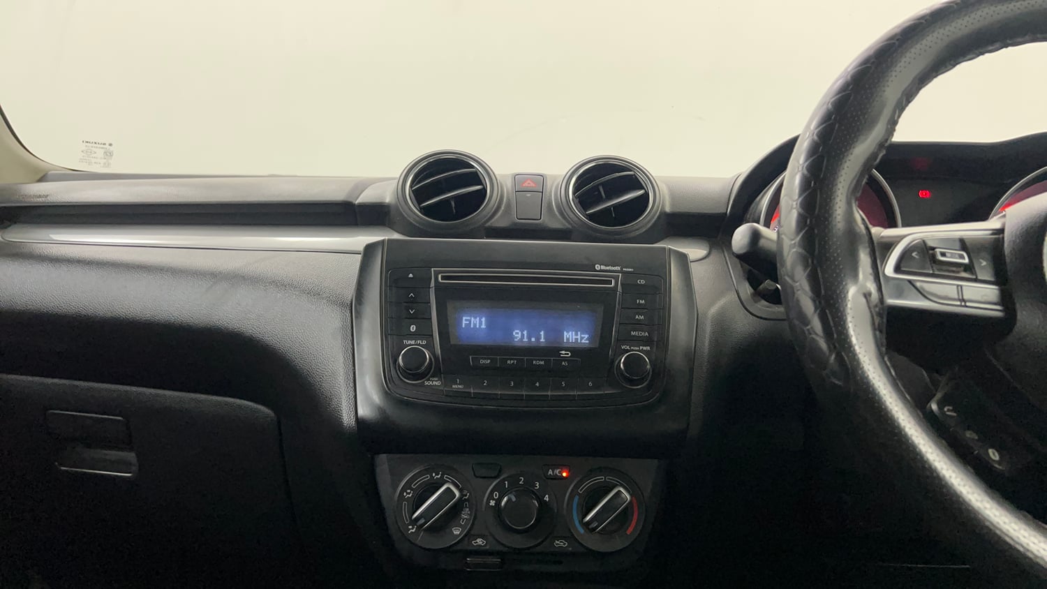 Used 2021 Maruti Suzuki Swift VXi Petrol Manual interior MUSIC SYSTEM & AC CONTROL VIEW