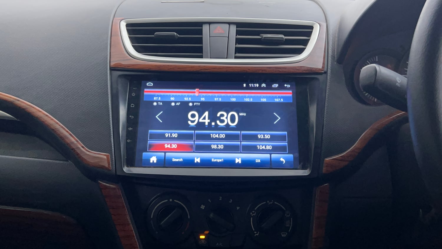 Used 2017 Maruti Suzuki Swift Lxi (O) Petrol Manual interior MUSIC SYSTEM & AC CONTROL VIEW