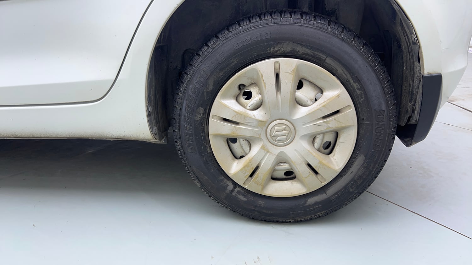 Used 2013 Maruti Suzuki Swift LXi Petrol Manual tyres LEFT REAR TYRE RIM VIEW