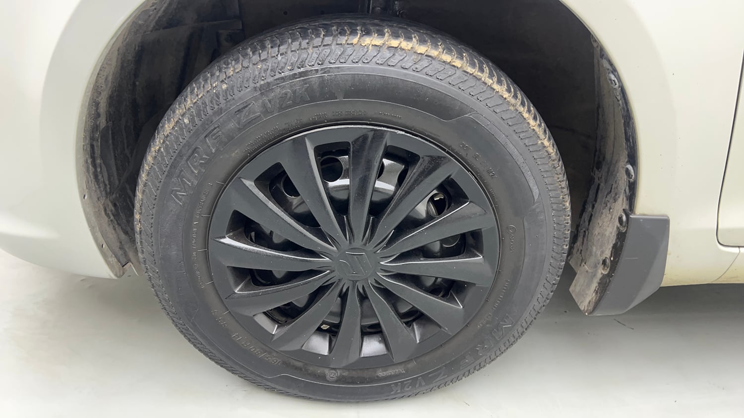 Used 2017 Maruti Suzuki Swift Dzire VXI Petrol Manual tyres LEFT FRONT TYRE RIM VIEW