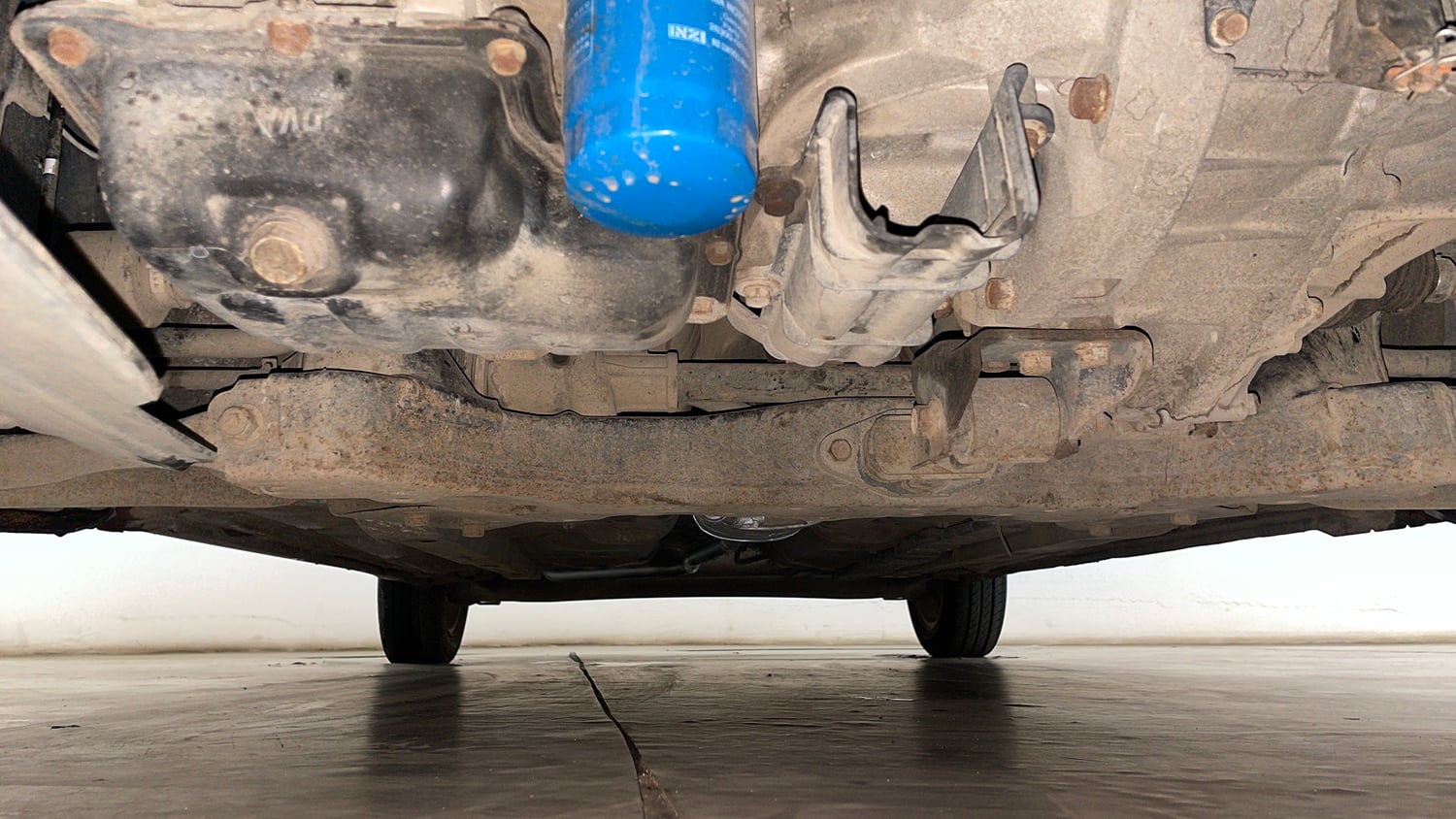 Used 2014 Hyundai Xcent S 1.2 (O) Petrol Manual extra FRONT LEFT UNDERBODY VIEW