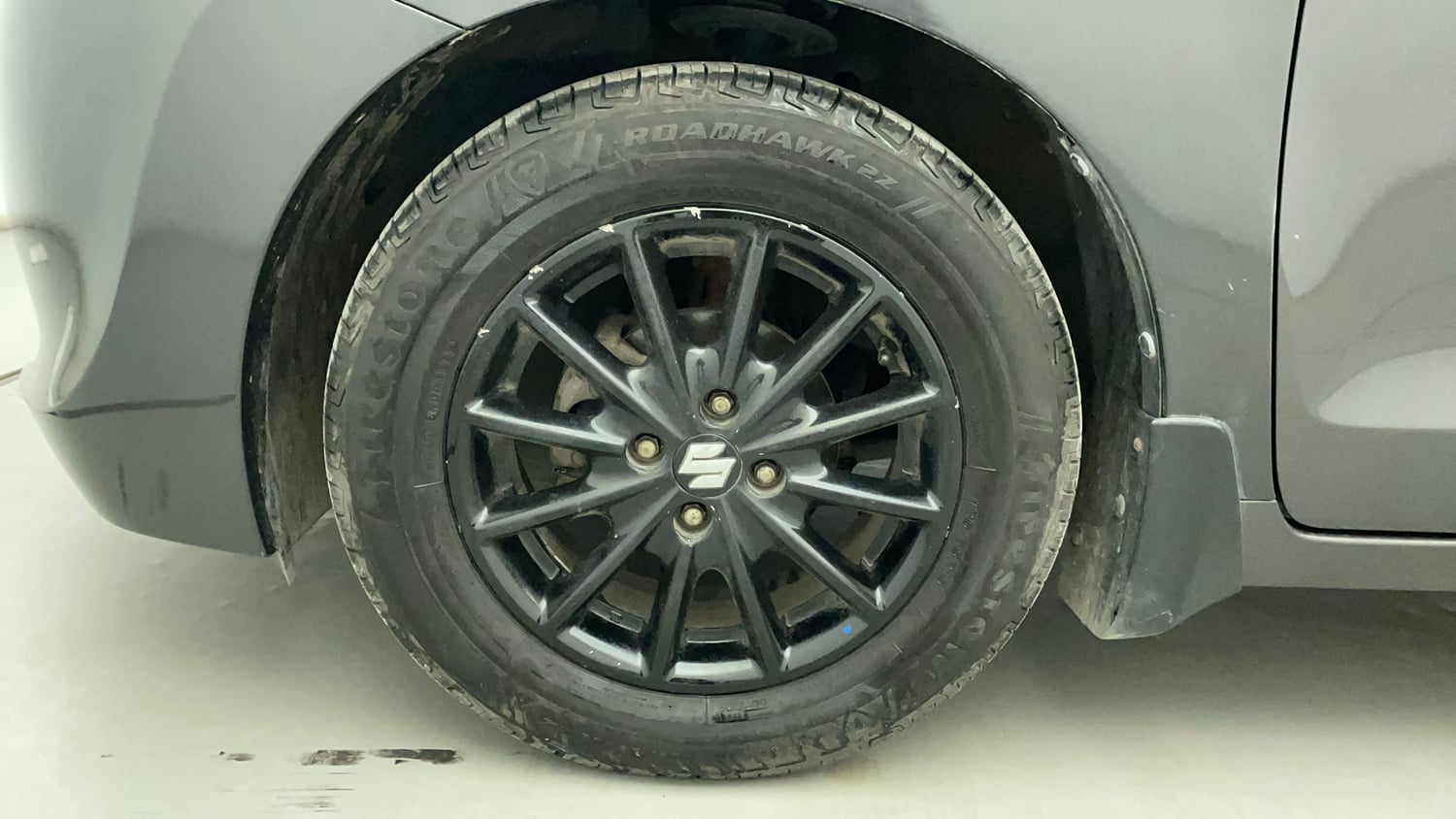 Used 2017 Maruti Suzuki Baleno Delta 1.2 Petrol Manual tyres LEFT FRONT TYRE RIM VIEW