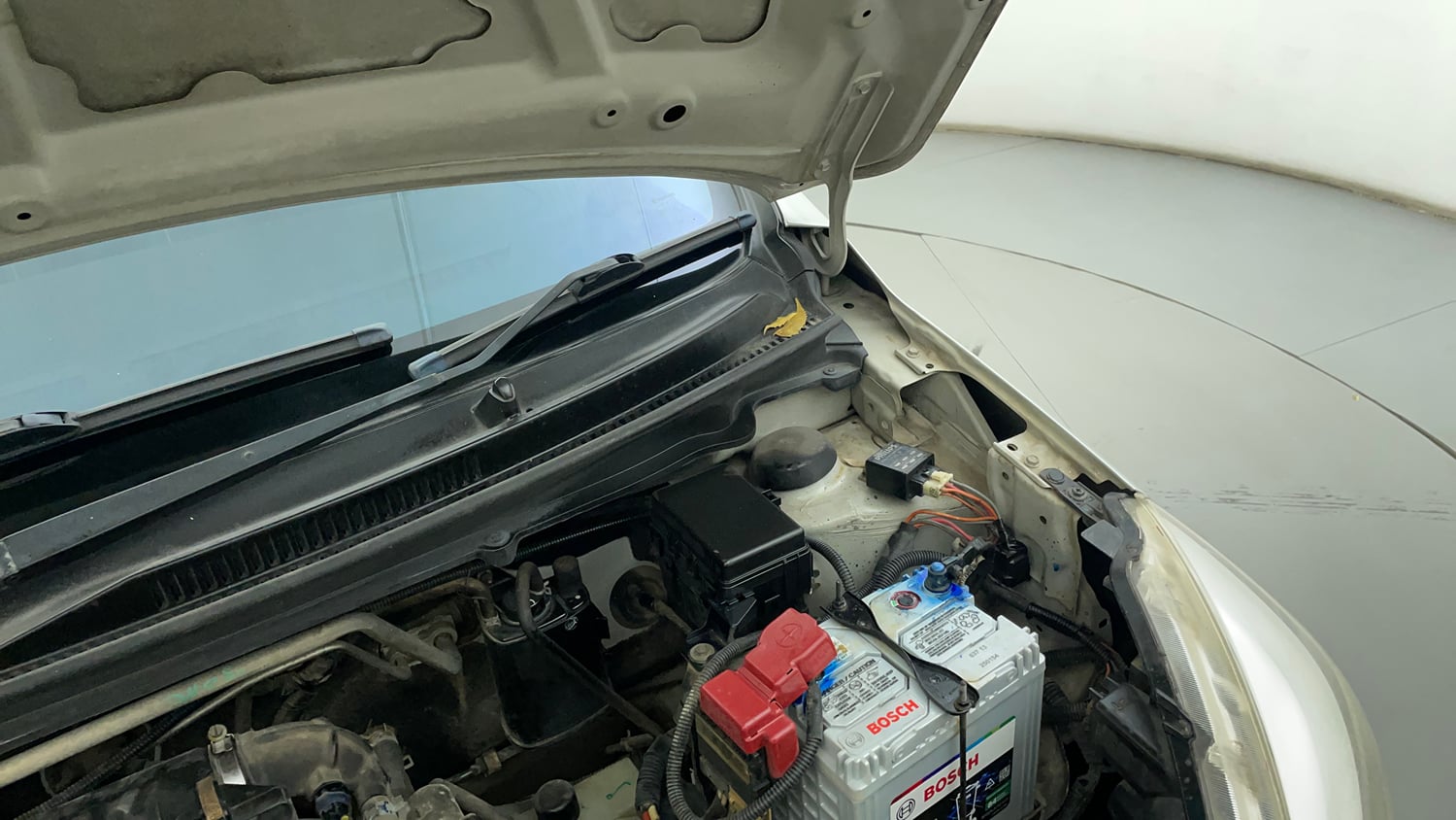 Used 2019 Maruti Suzuki Celerio ZXi (O) AMT Petrol Automatic engine ENGINE LEFT SIDE HINGE & APRON VIEW