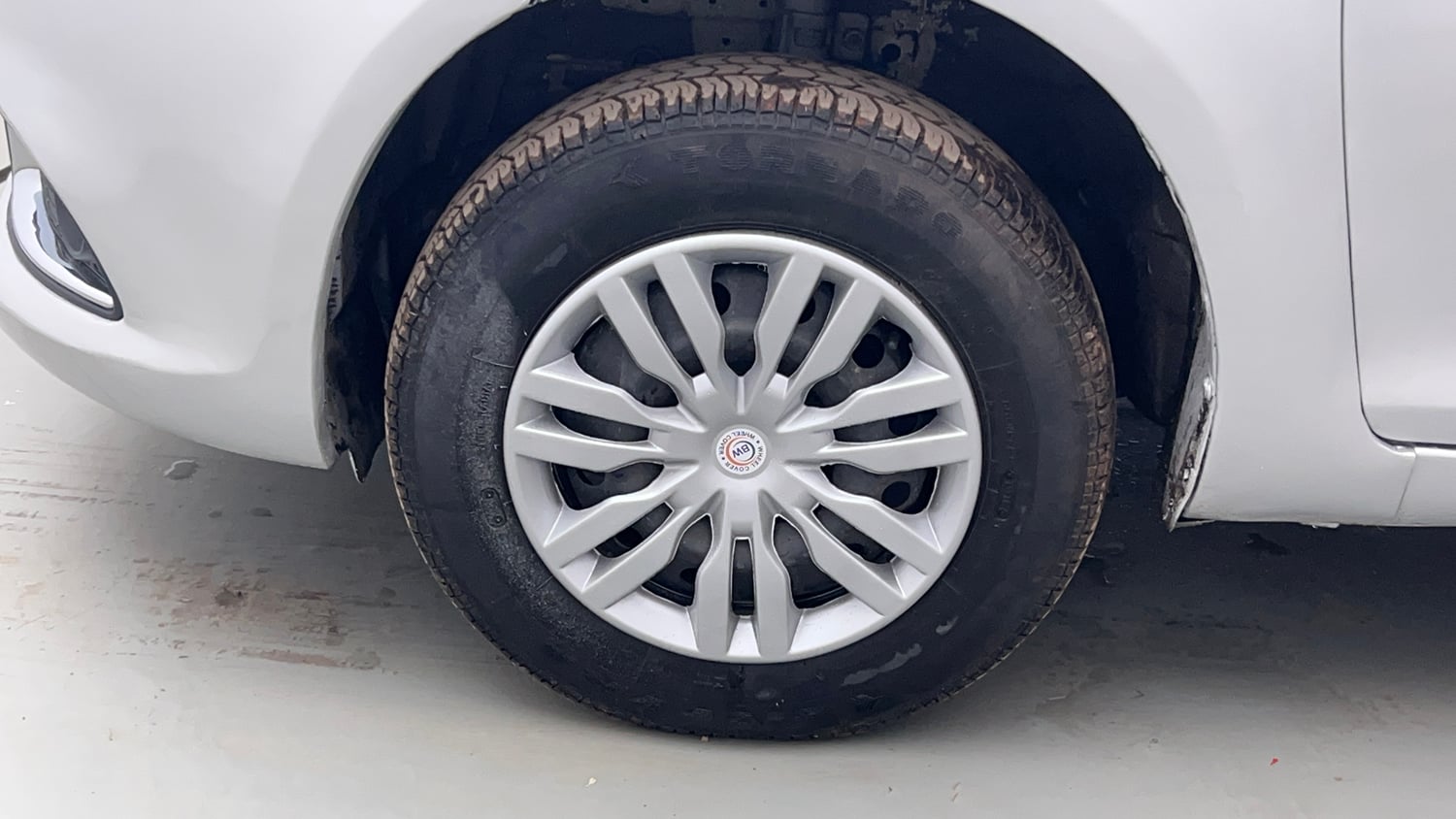 Used 2016 Maruti Suzuki Swift Dzire VXI Petrol Manual tyres LEFT FRONT TYRE RIM VIEW