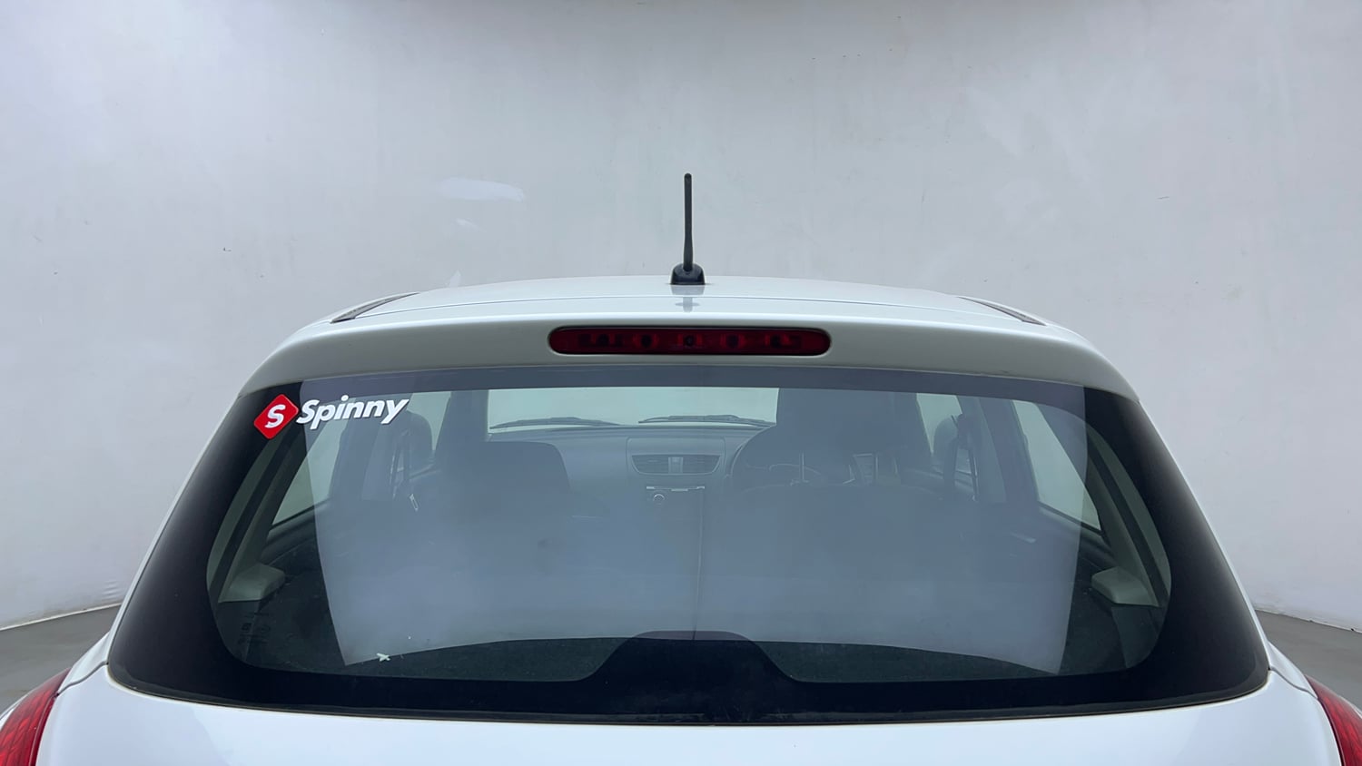 Used 2013 Maruti Suzuki Swift LXi Petrol Manual exterior BACK WINDSHIELD VIEW