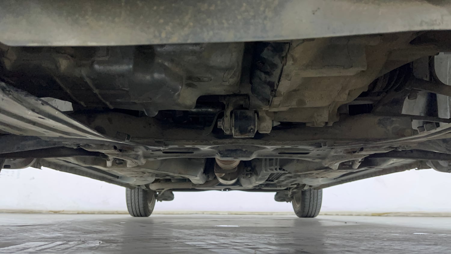 Used 2013 Honda Brio V MT Petrol Manual extra FRONT LEFT UNDERBODY VIEW