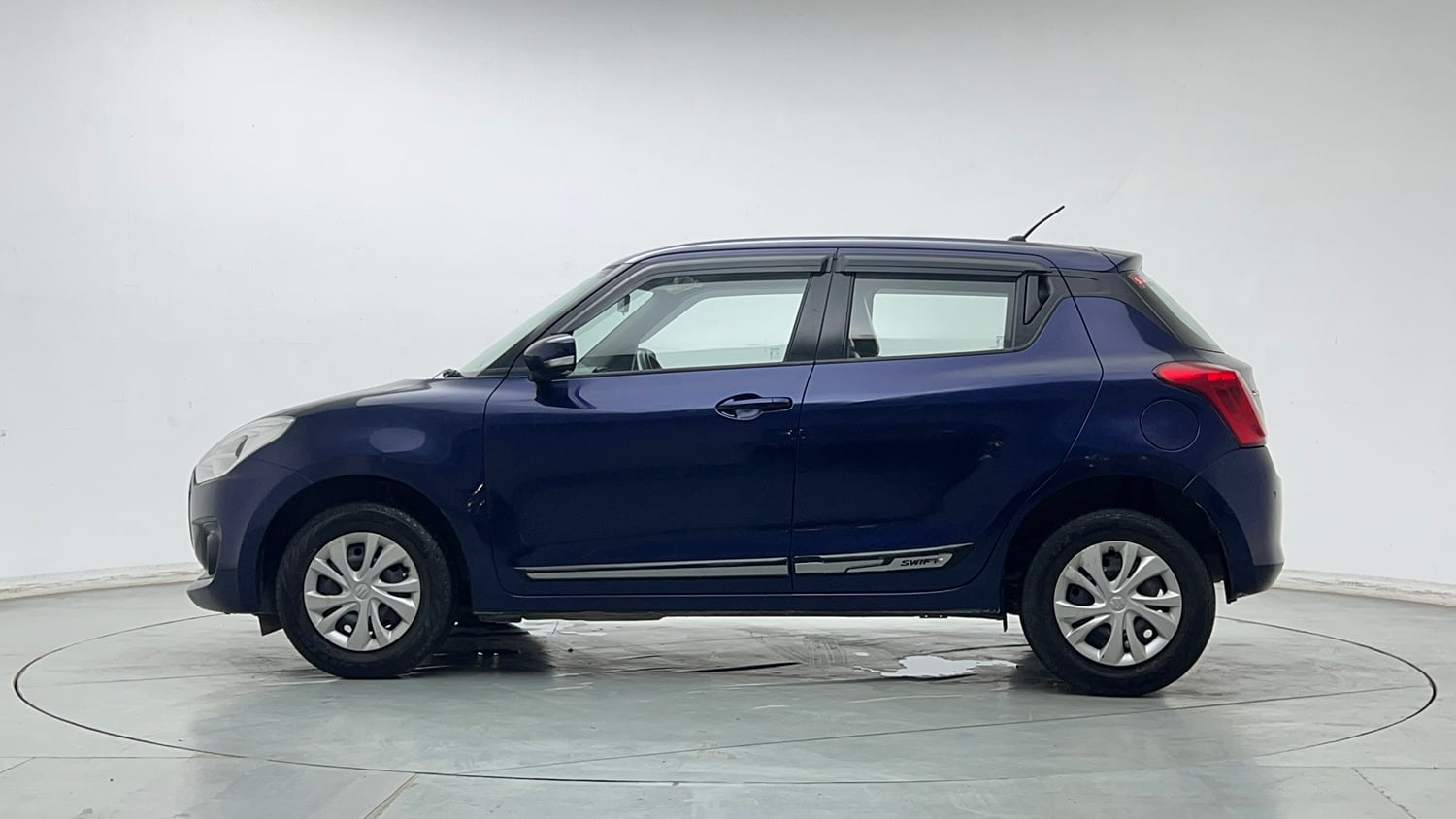 Used 2022 Maruti Suzuki Swift VXi Petrol Manual exterior LEFT SIDE VIEW