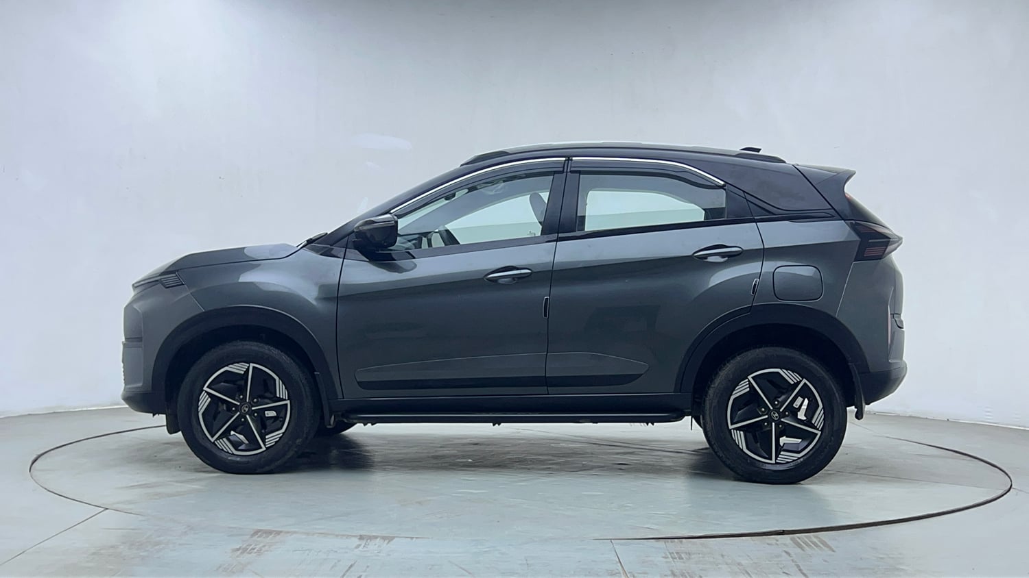 Used 2024 Tata Nexon Fearless Plus 1.2 Revotron Petrol 7DCA DT Petrol Automatic exterior LEFT SIDE VIEW