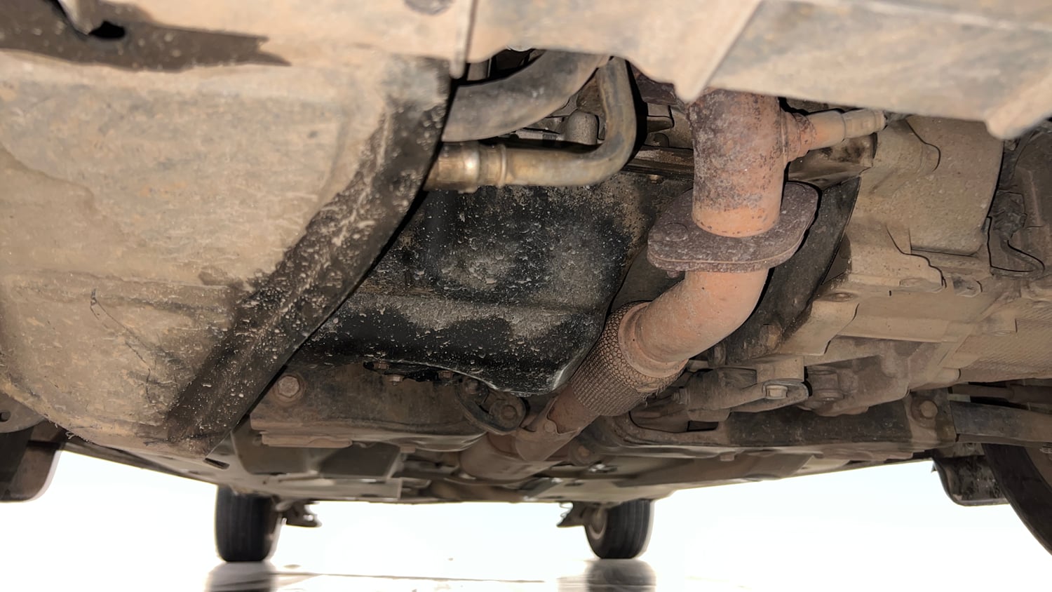 Used 2016 Volkswagen Vento Highline 1.2 (P) AT Petrol Automatic extra FRONT LEFT UNDERBODY VIEW