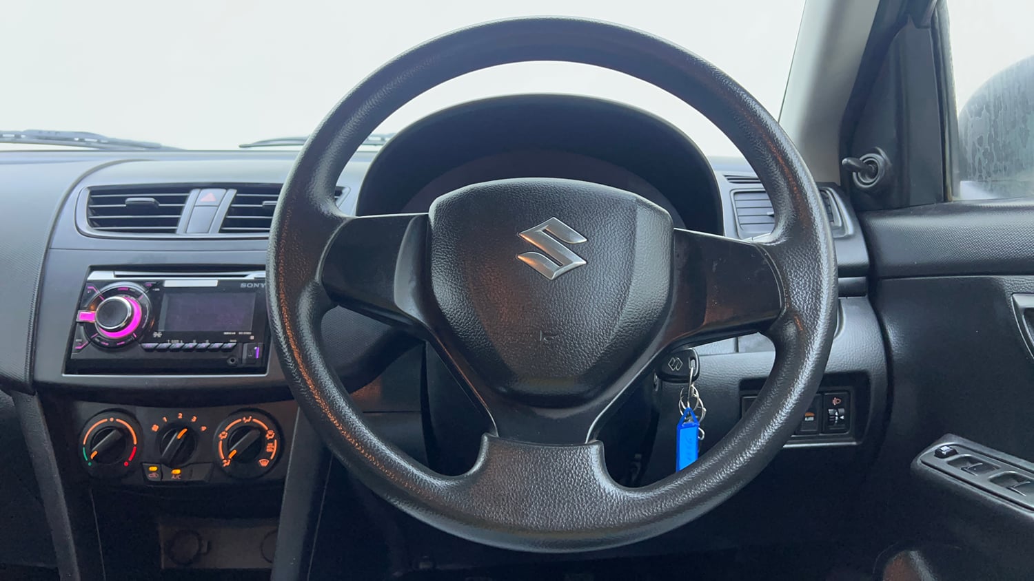 Used 2013 Maruti Suzuki Swift LXi Petrol Manual interior STEERING VIEW
