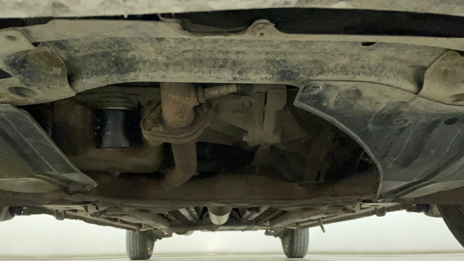 Used 2013 Maruti Suzuki Ertiga ZXi Petrol Manual extra FRONT LEFT UNDERBODY VIEW