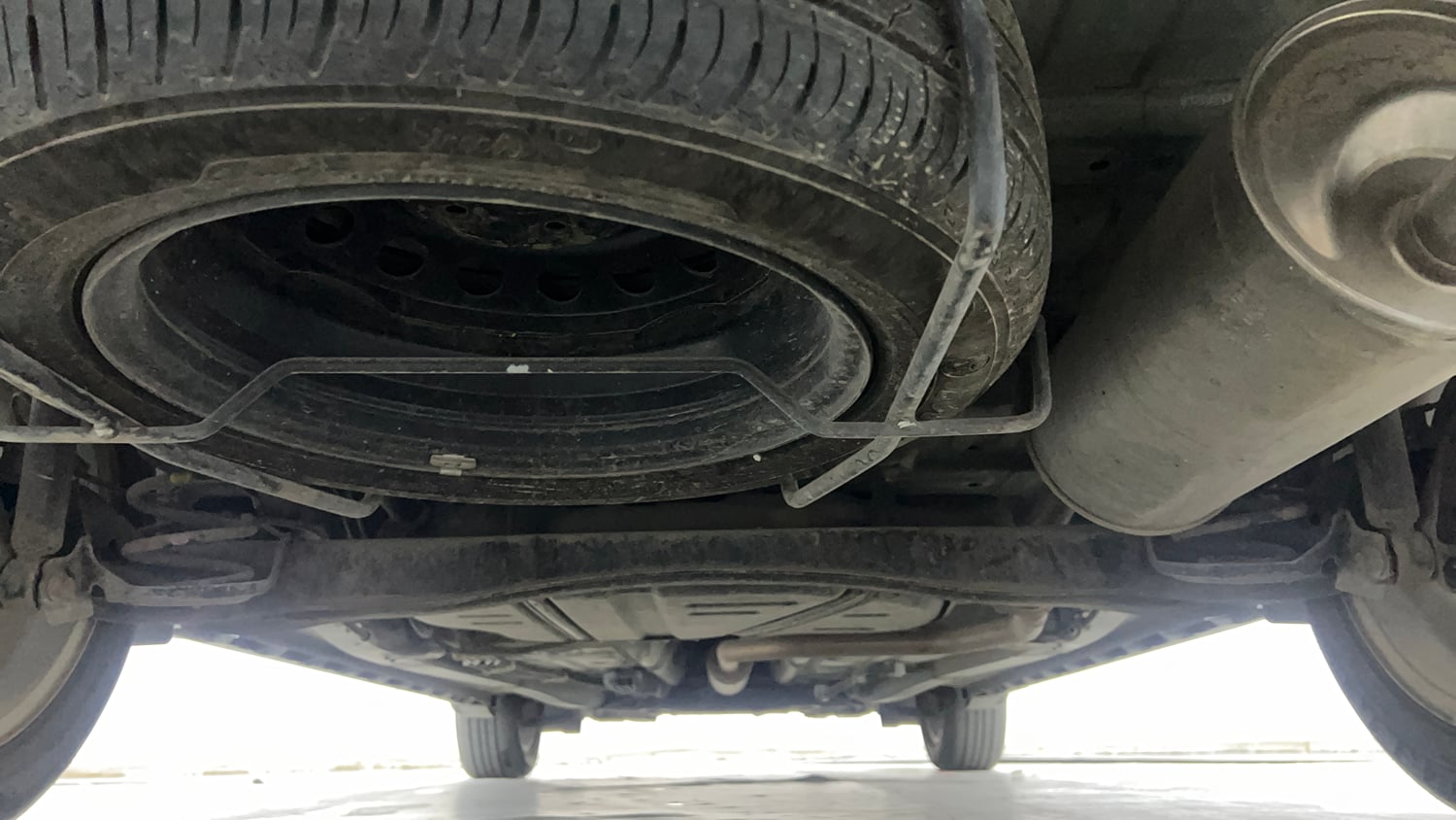 Used 2023 Maruti Suzuki XL6 Alpha AT Petrol Petrol Automatic extra REAR UNDERBODY VIEW (TAKEN FROM REAR)